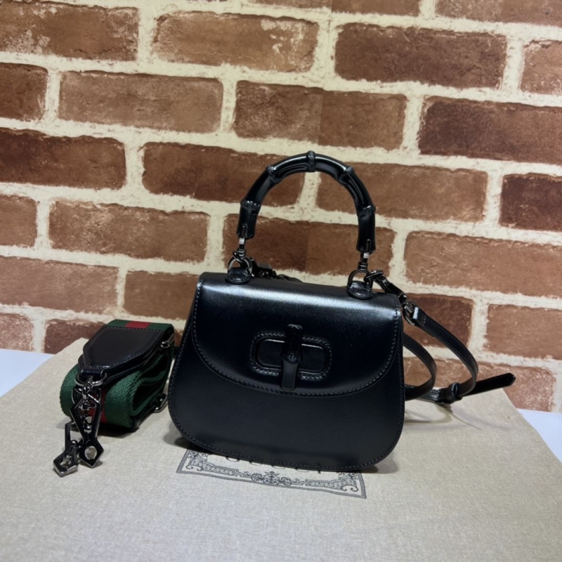 G*u*i top handle bags